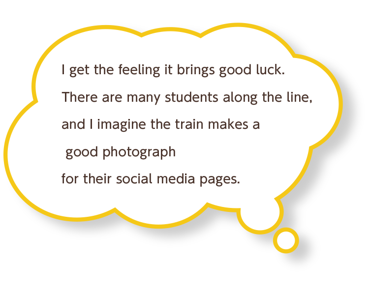 I get the feeling it brings good luck. There are many students along the line, and I imagine the train makes a good photograph for their social media pages.